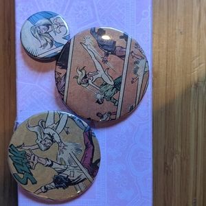Three pins made from vintage cloak and dagger comics